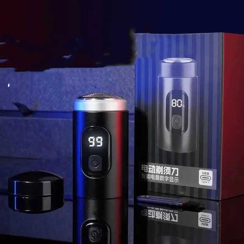 Black household mini portable rechargeable shaver with USB cable and cleaning brush on a white background.