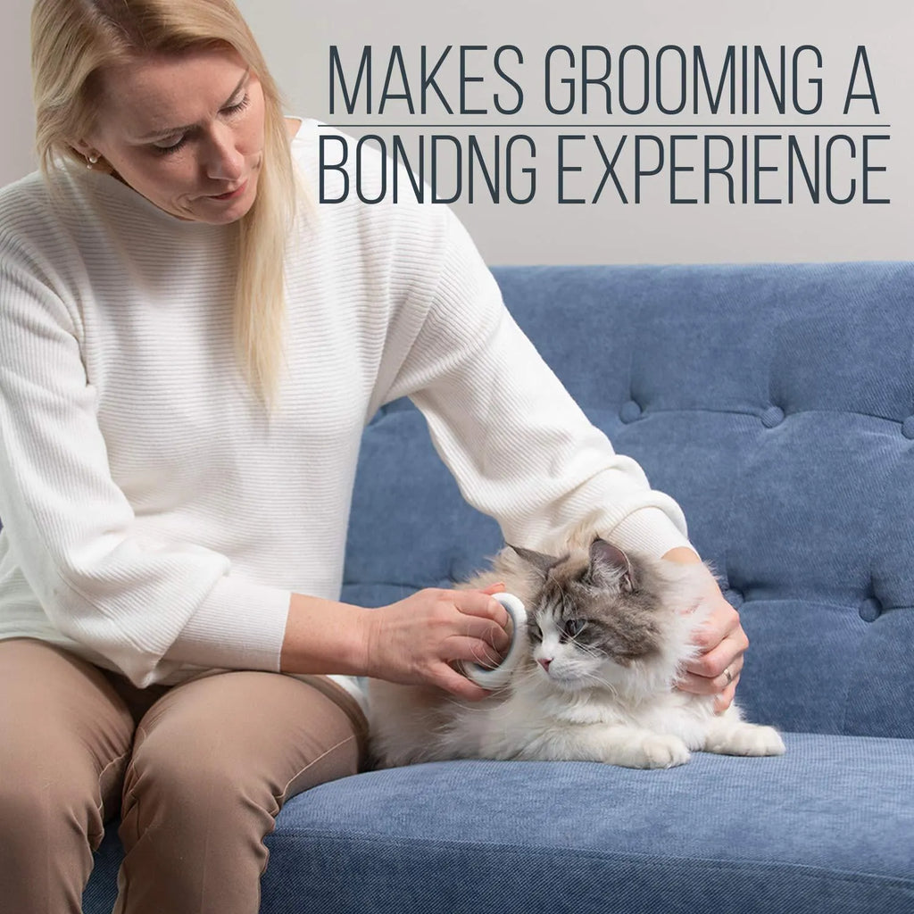 Blue ergonomic pet deshedding comb for cats and dogs on a white background.