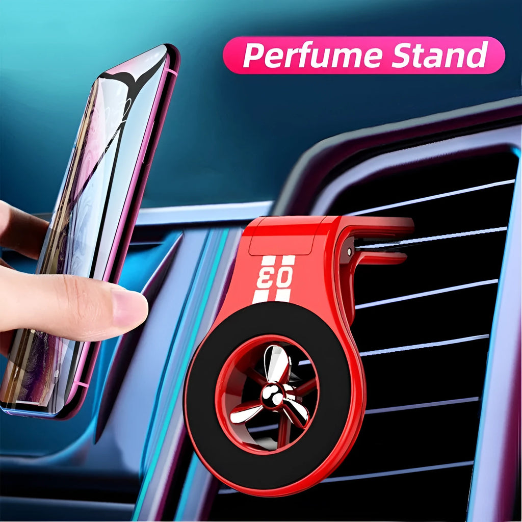 Black magnetic car phone holder with perfume slices, clipped on a car air vent