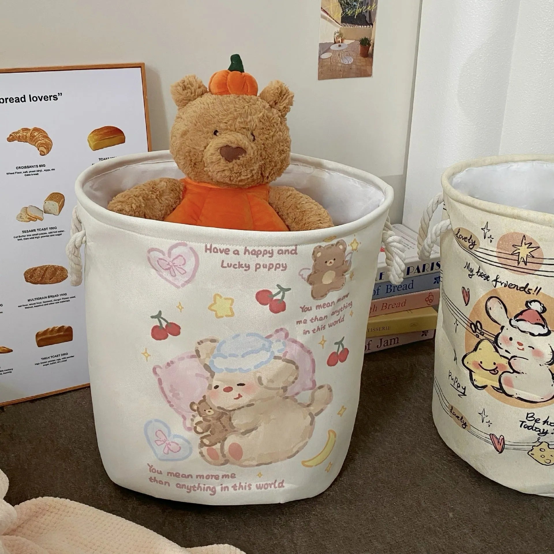 Foldable cotton cloth laundry basket in a choice of colours like puppy print or mint green.