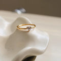 Golden electroplated stainless steel ring showing love heart and oval shapes in sizes no.5 to no.8
