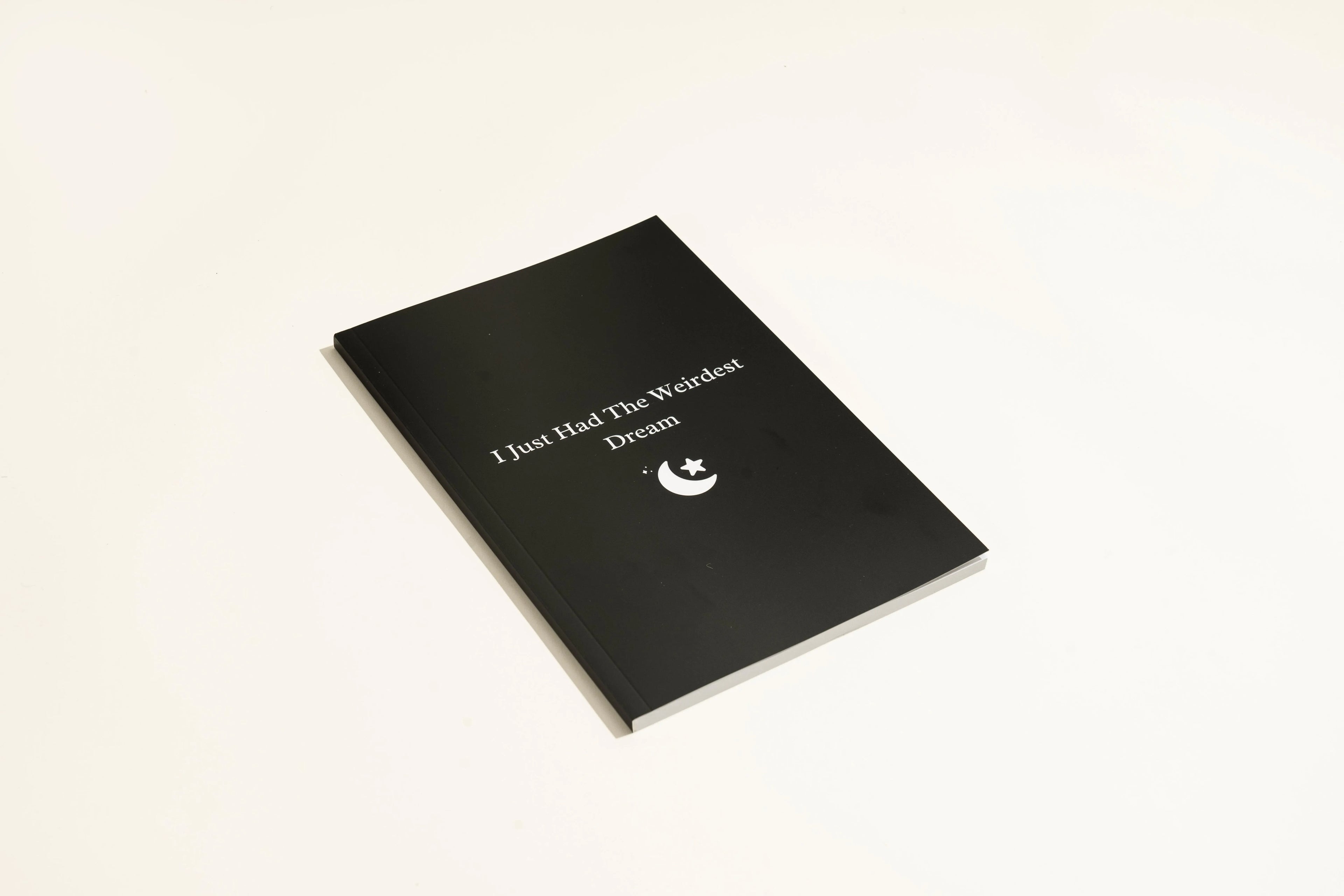 Black cover dream journal notebook with business simplicity style.