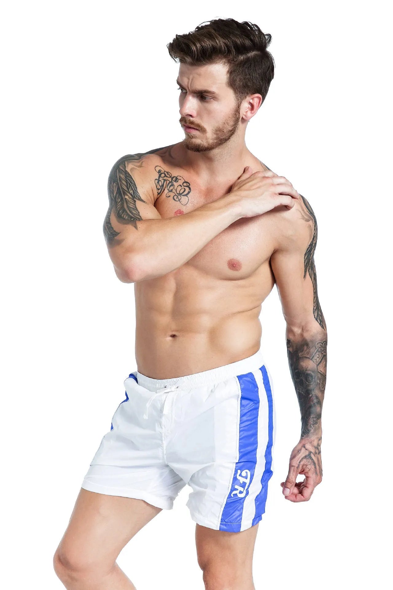 Man modelling blue casual sports shorts with lace-up front and slim fit.