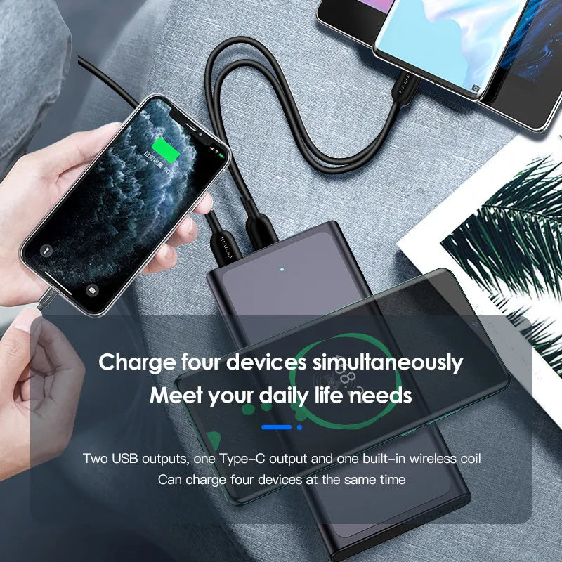 Black and blue square aluminum wireless charging power bank with integrated plug.