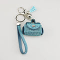 Leather diamond coin purse earphone bag in black with zip closure and keychain pendant