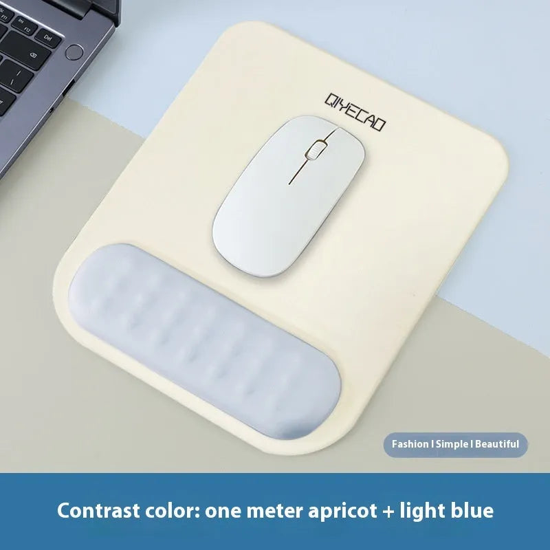 Ergonomic mouse pad with raised wrist support in a choice of contrast colour patterns on a desk.