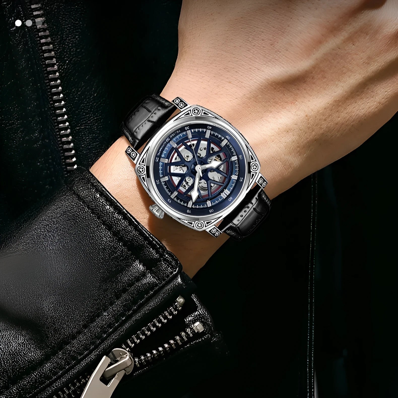 Men's stainless steel automatic mechanical watch with a leather strap on a wrist