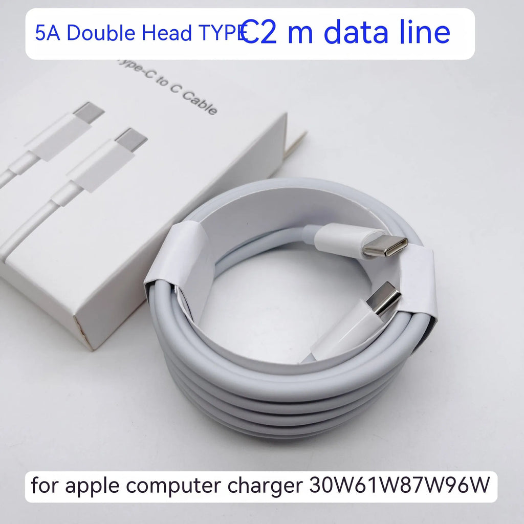 Laptop power adapter with choice of international plugs and a USB-C to USB-C cable.