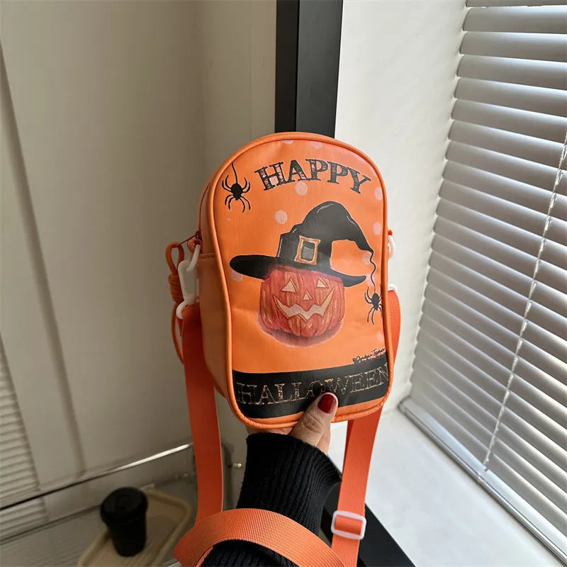 Black Halloween-themed mini crossbody bag with cartoon pumpkin, ghost, and bat prints.