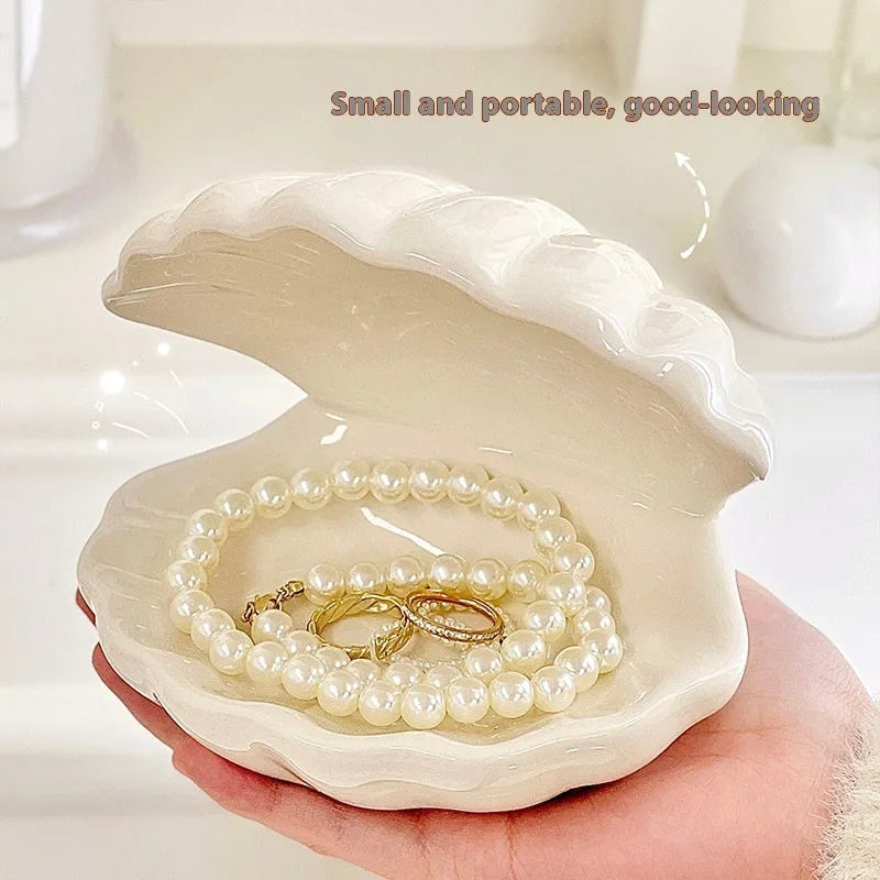 Yellow porcelain tray with a choice of pink or white decorative shell, some versions include a small integrated night light.