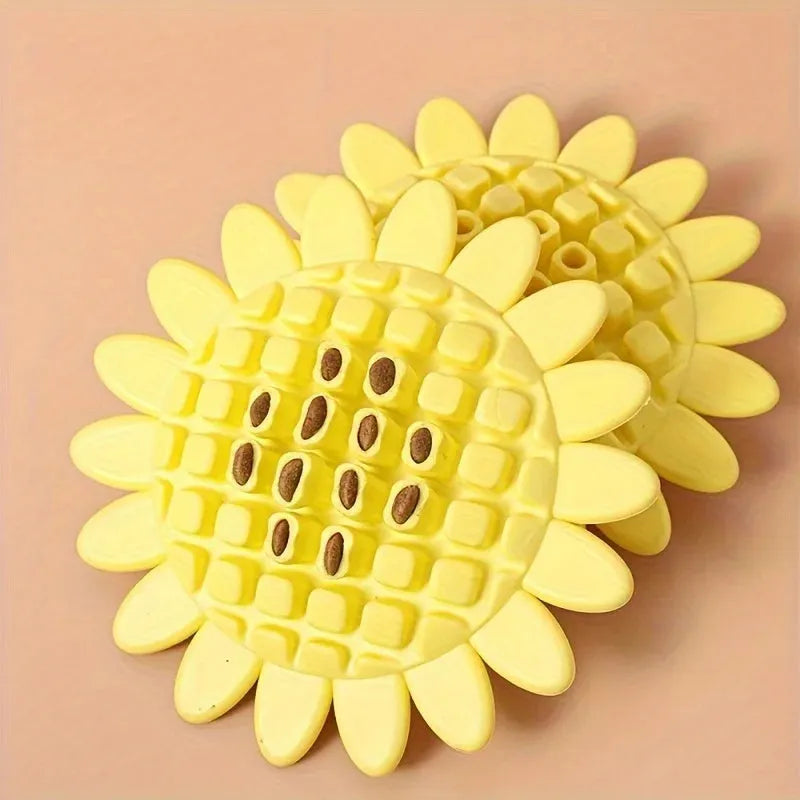 Yellow rubber sunflower-shaped dog chew toy measuring 7 cm across with textured petal surface