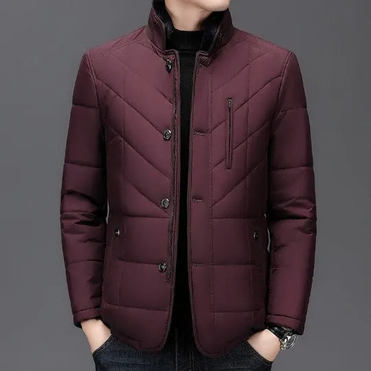 Men's dark blue winter short cotton-padded coat with side seam pockets.