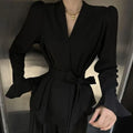 Women's French-style long sleeve tied shirt with irregular collar and bell sleeves in polyester fabric