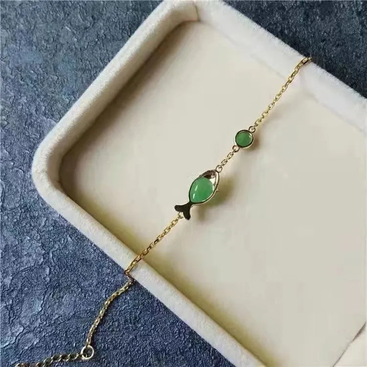 Retro style electroplated yellow gold bracelet made from copper and plastic materials.