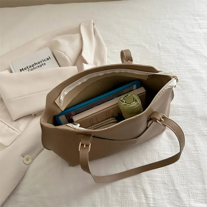 PU leather women's tote bag with double straps and internal phone compartment in multiple colour options