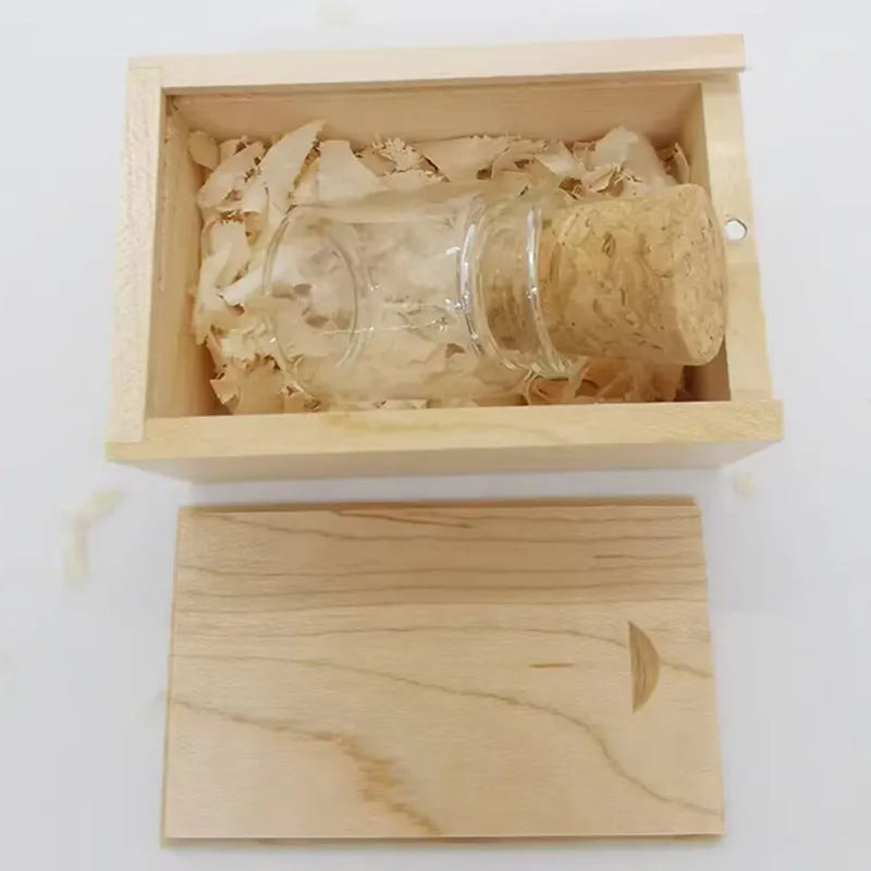 Wooden USB flash drive shaped like a drift bottle in a transparent casing.