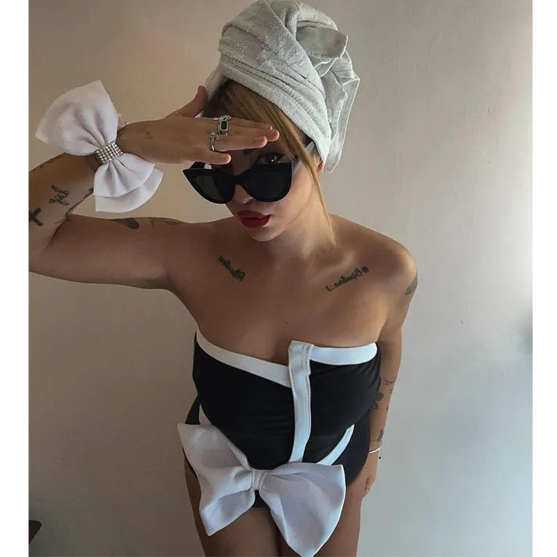 Black and white colour-block women's swimsuit with bow detail and irregular tube top
