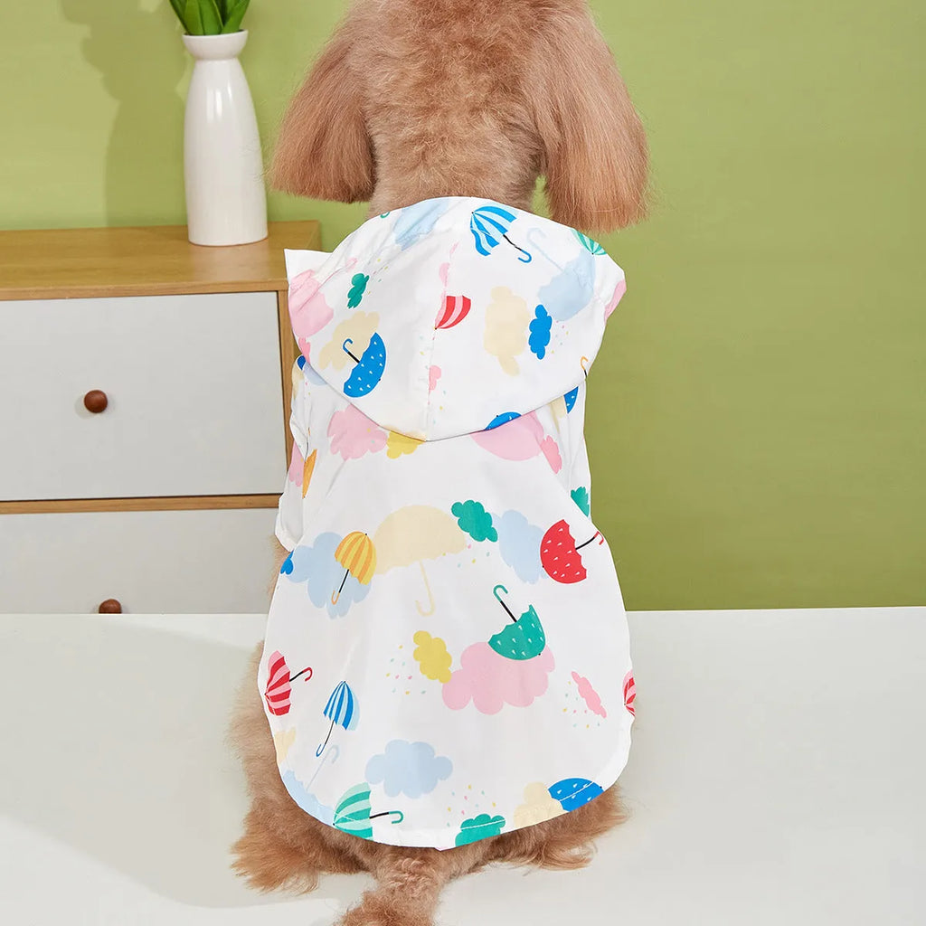 Colourful dog raincoat with a cartoon umbrella pattern, shown in size L on a mannequin.