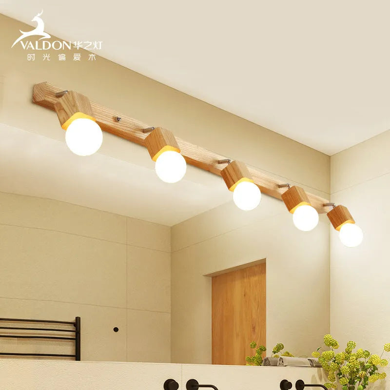Single head LED wall lamp in 24cm size for bathroom or bedroom mirror lighting.