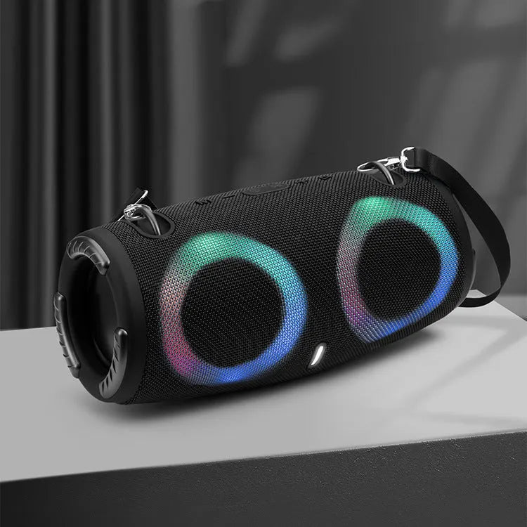 War Drum portable Bluetooth speaker in multiple colours with RGB lights and a carrying strap.