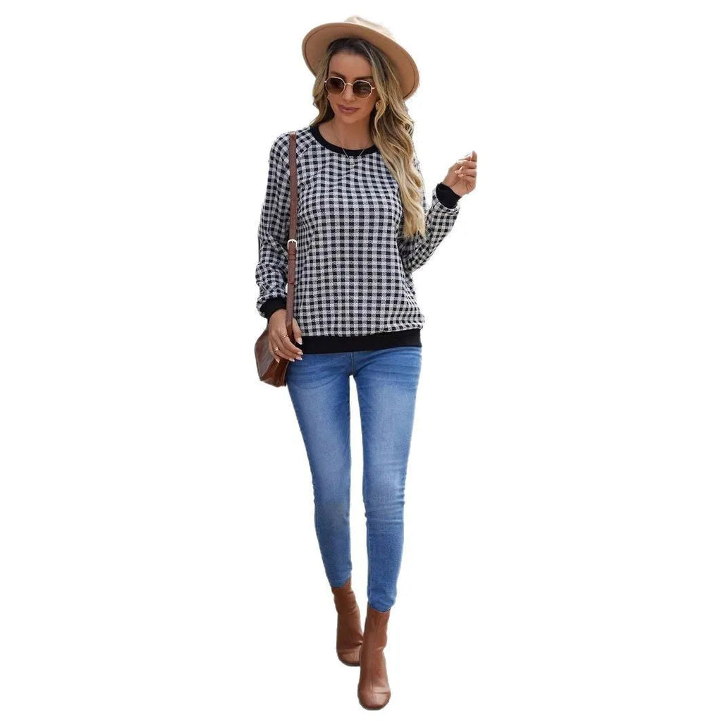 Black pullover sweater with Japanese plaid and printed stripe patterns, long sleeves