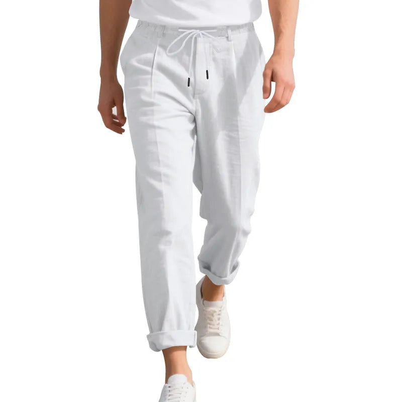 Men's linen casual trousers in a straight-leg style with drawstring waist, shown in a summer colour option.