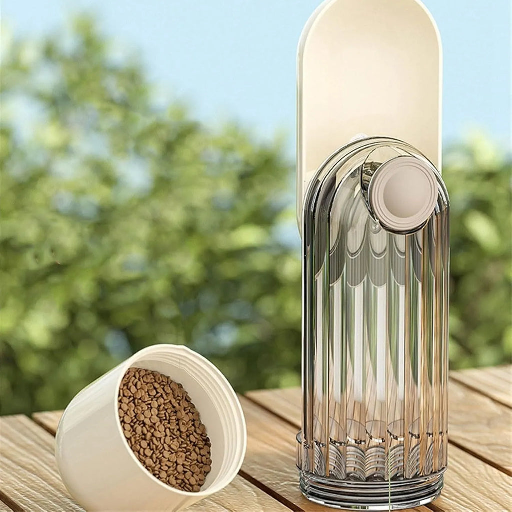 Beige dog water bottle with foldable silicone tray and integrated food dispenser base.