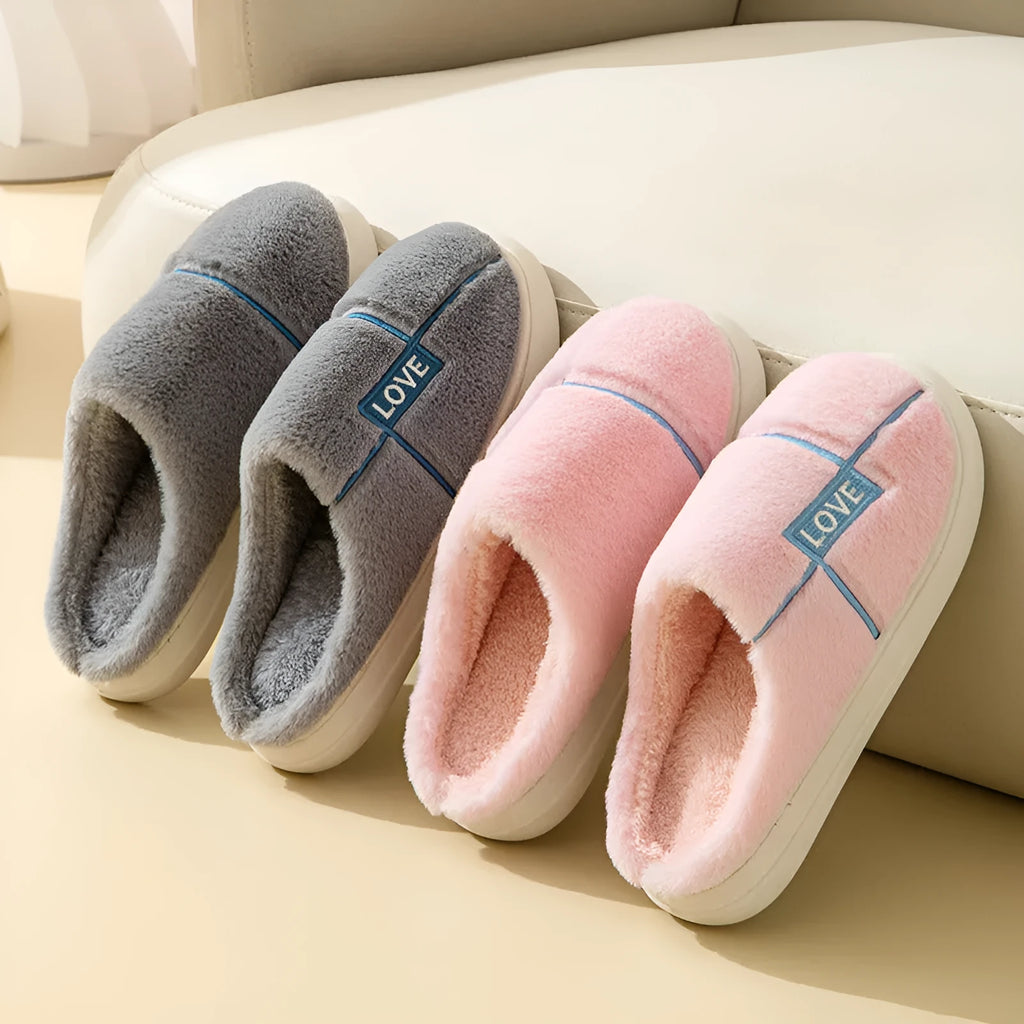 Women's furry indoor slippers in solid colour with plush upper, rubber sole, and wrapped toe, available in multiple colours