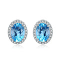 925 sterling silver jewellery set with blue topaz gemstones including earrings, ring, pendant and necklace