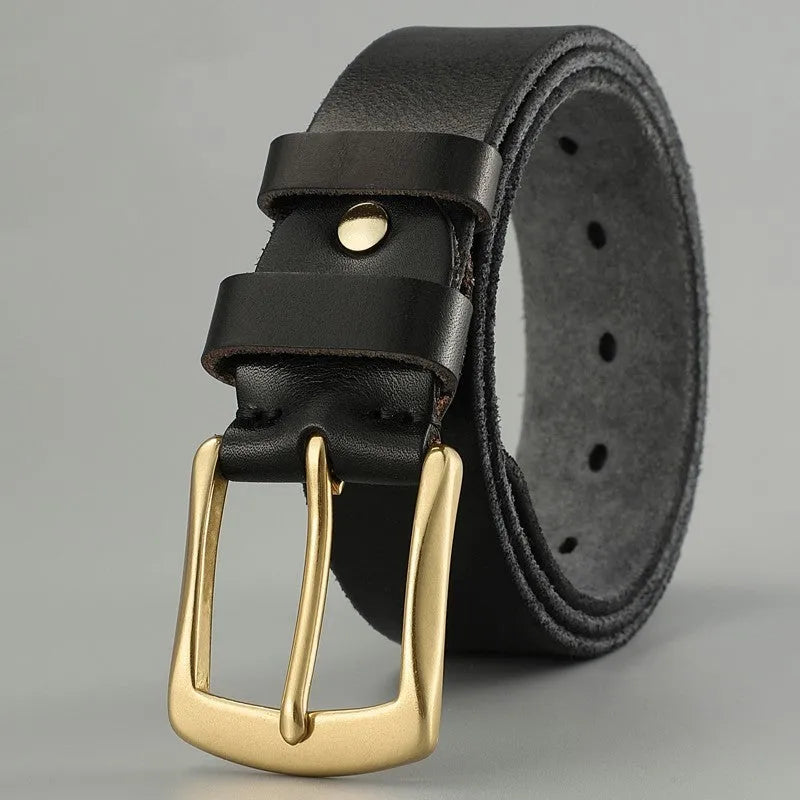 Handmade casual men's cowhide belt with needle buckle and leather decoration, black colour, on a plain background