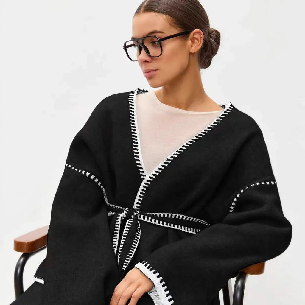 Loose fit knitted cardigan coat in imitation cashmere fabric showing front cardigan styling and long sleeves