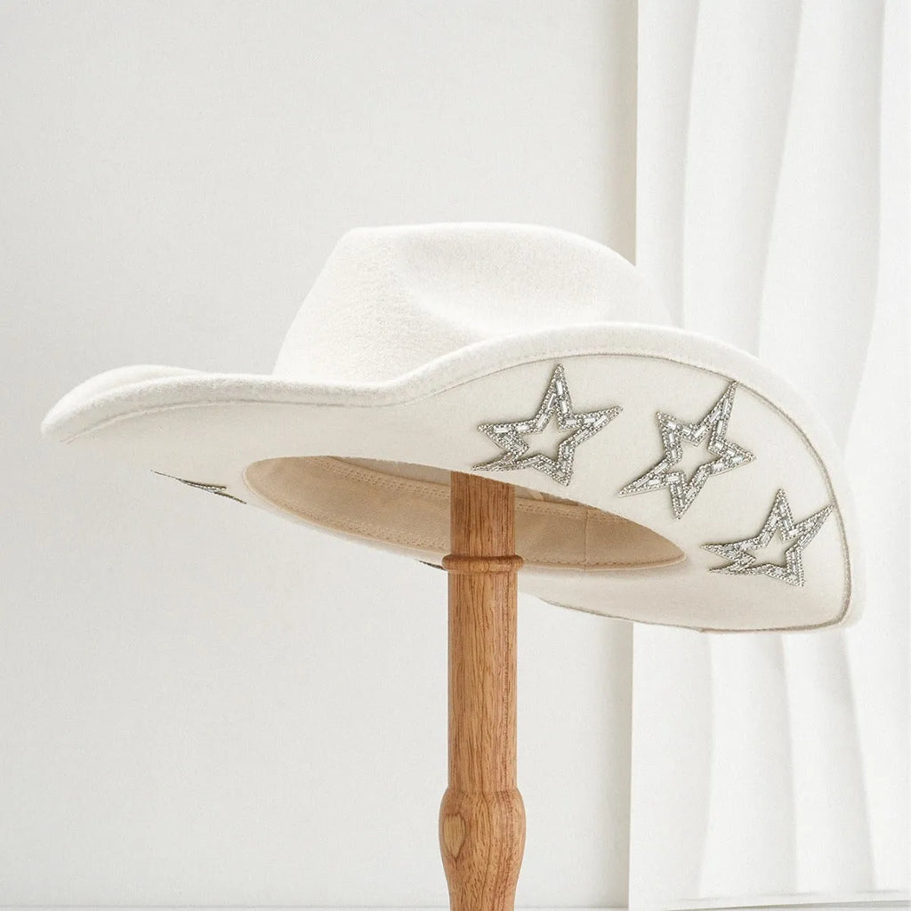 A beige woven polyester Western-style top hat with a conical crown and a hexagonal star detail on the front.