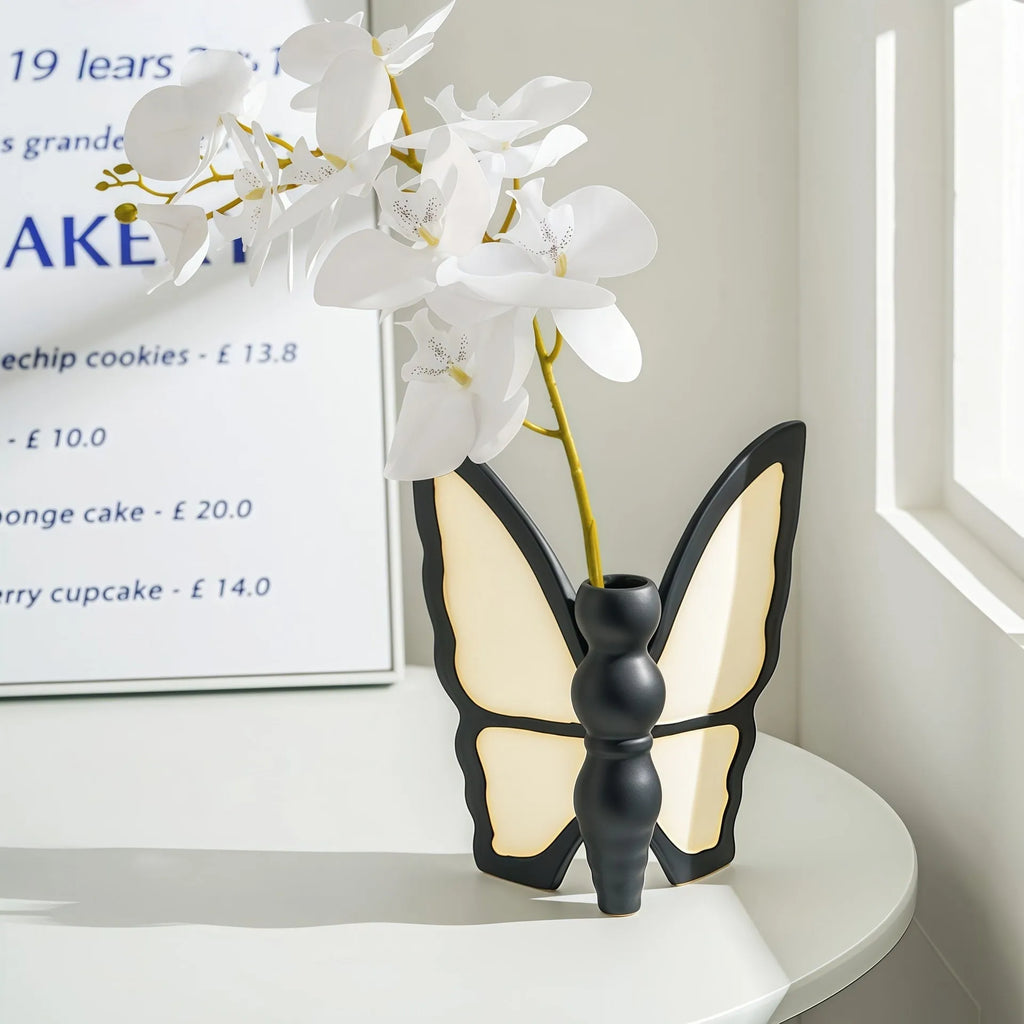 White ceramic butterfly vase and matching tissue box with waterproof coating