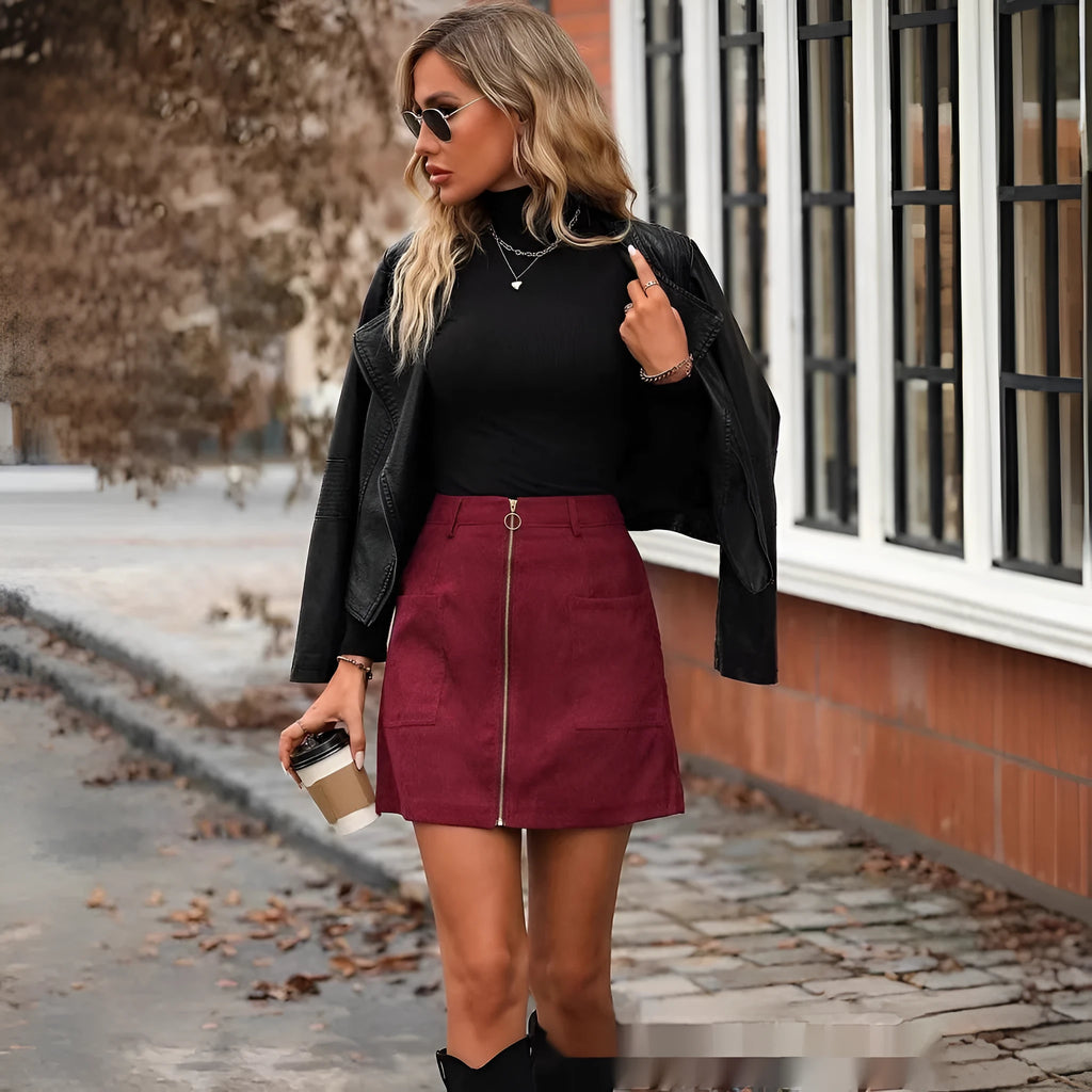Women's high waist short skirt with stitching detail and zip closure in dark green colour