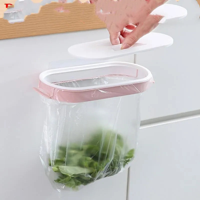Blue or pink plastic kitchen garbage bag storage rack mounted to cabinet