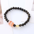 Natural obsidian Pi Xiu bracelet with ethnic retro design on wrist