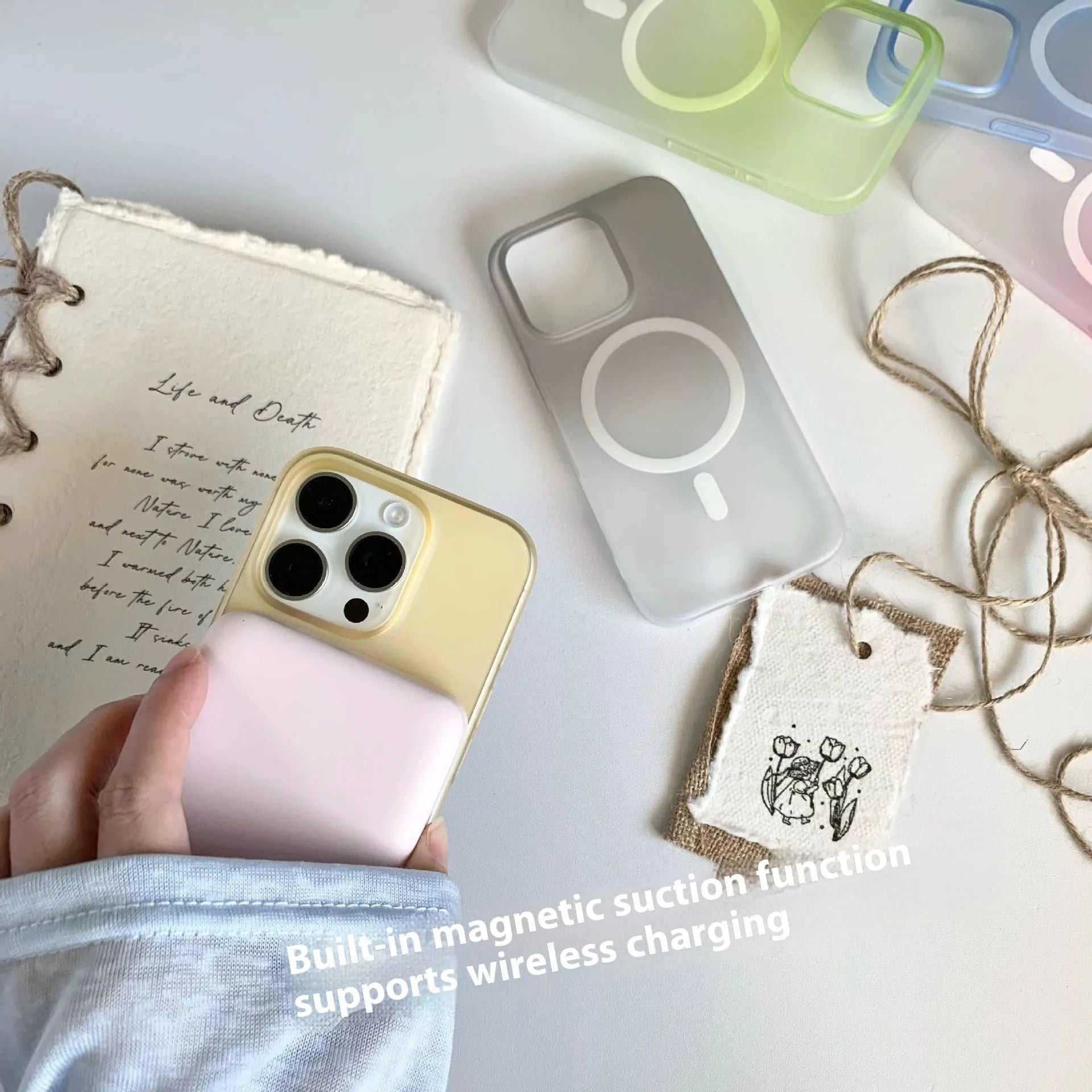 Gradient frosted magnetic suction case for iPhone on a table, showing ultra-thin profile and colour blend.