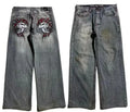 Men's grey washed-out straight-leg jeans with wide-leg workwear design.