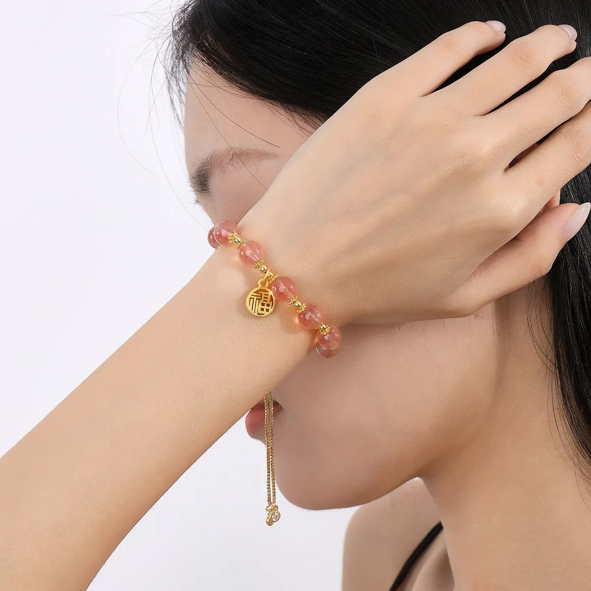 Strawberry quartz crystal bracelet with geometric shapes and fu charm for women