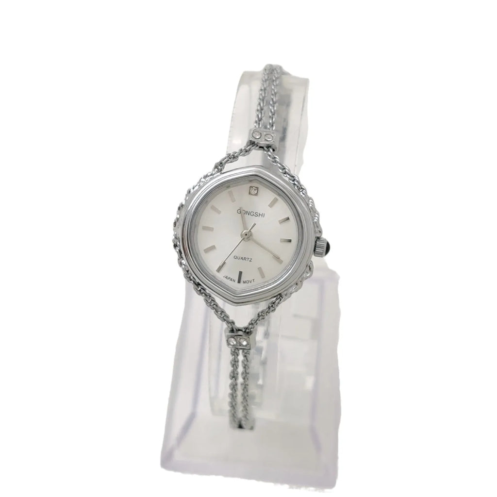 Women's Mori style quartz watch with 25mm dial, 7mm thickness, mineral glass face and chain strap in gold or silver
