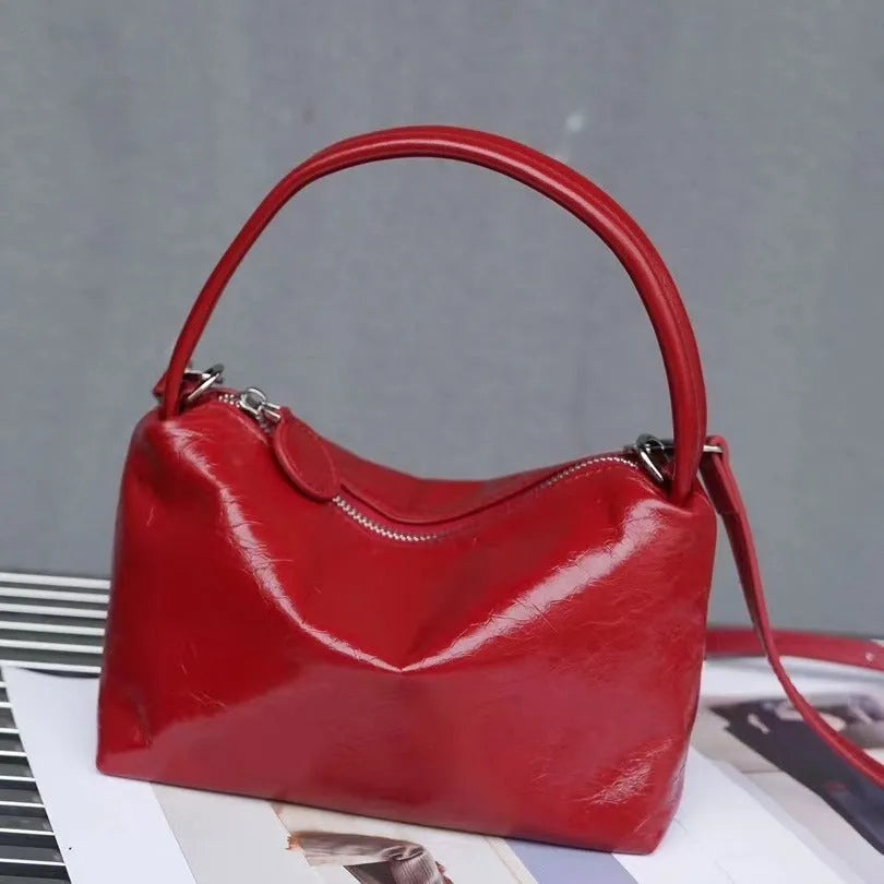 Genuine leather patent glossy shoulder underarm bag in horizontal square shape with internal pockets