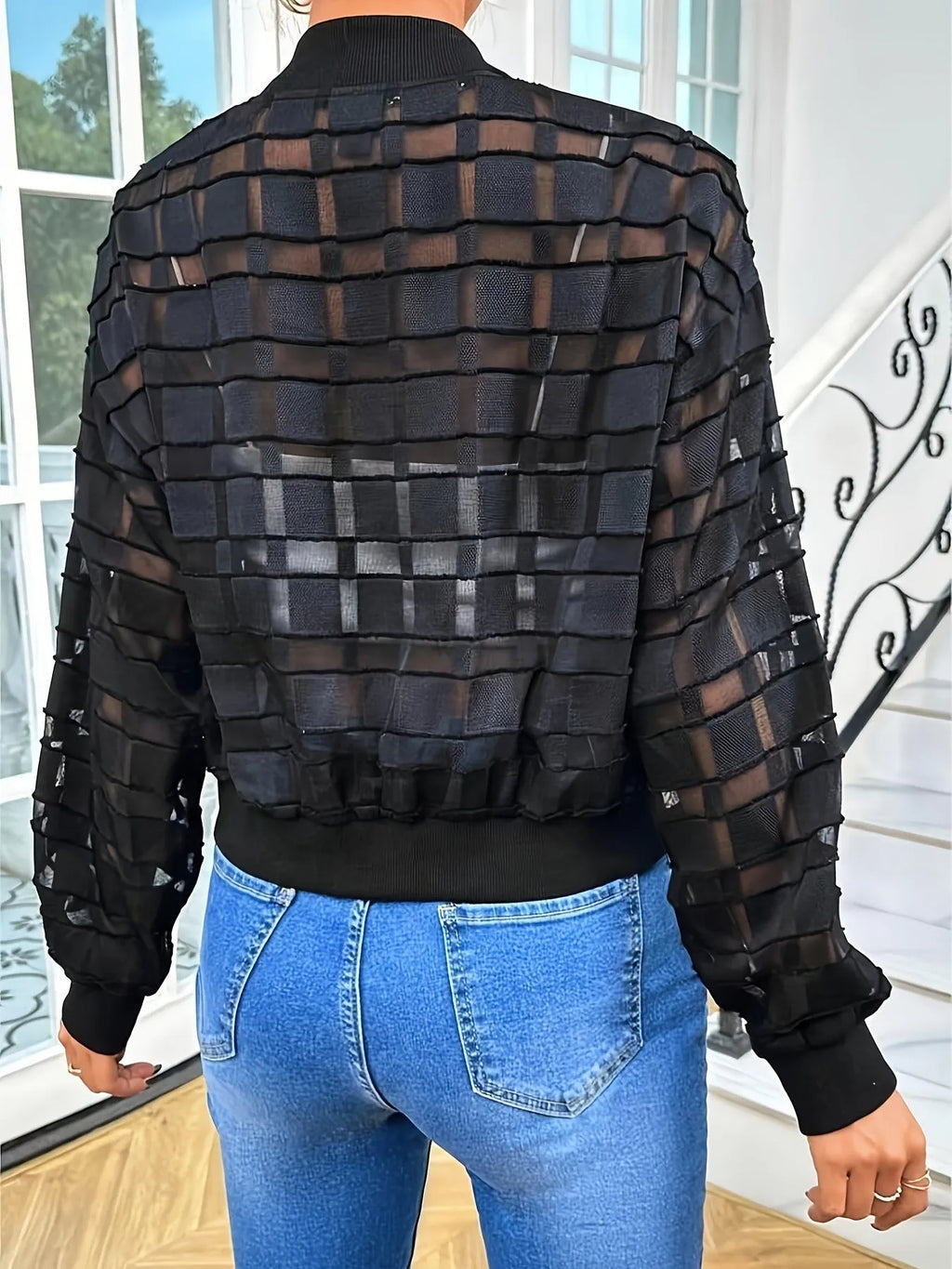 Black women's casual jacket with geometric pattern and thread zipper.