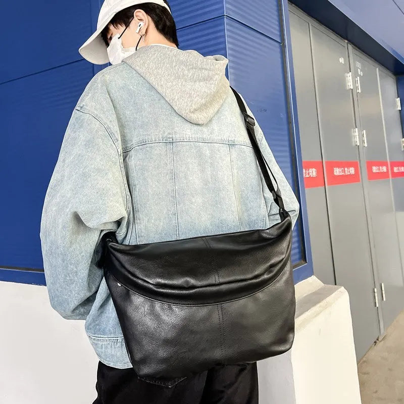 Retro fashion men's large capacity crossbody bag in PU material with waterproof properties