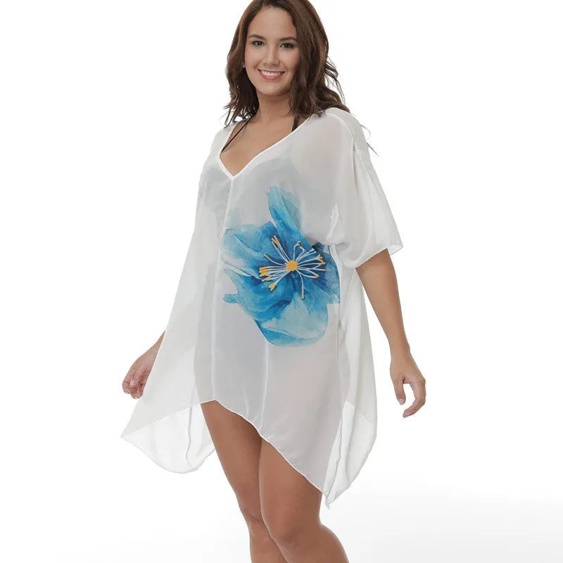 White plus size loose beach cover-up blouse on a hanger