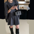 Women's grey art retro knitted cardigan and pleated vest skirt set with a belt.