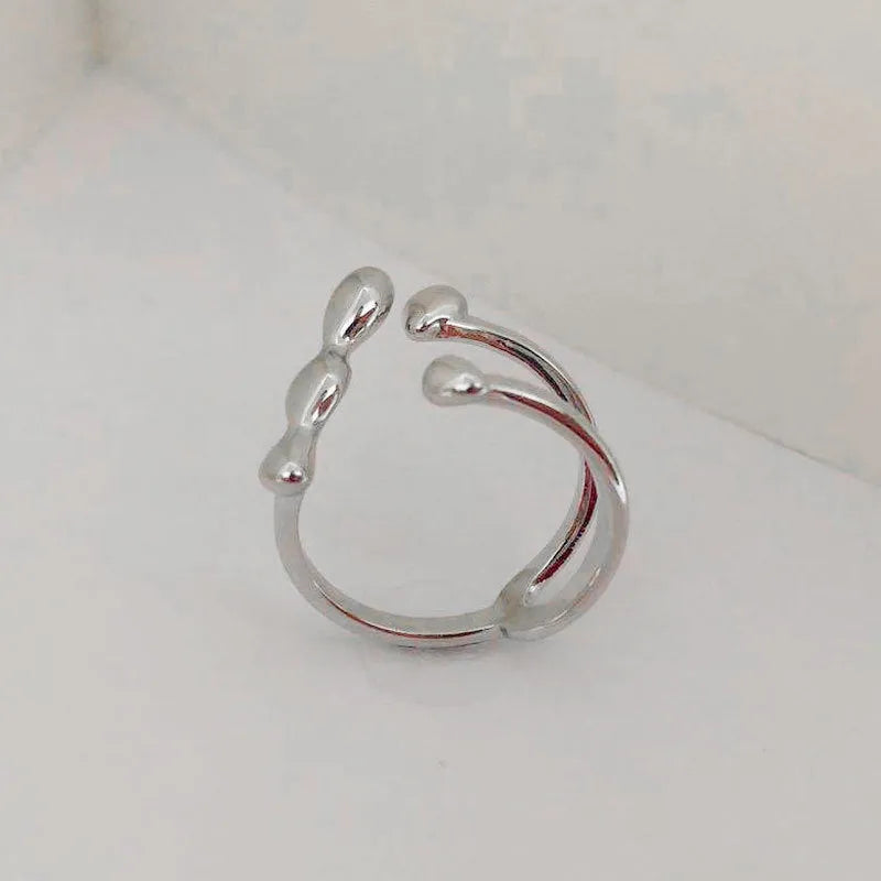 Brass adjustable circle ring with spherical design in gold finish