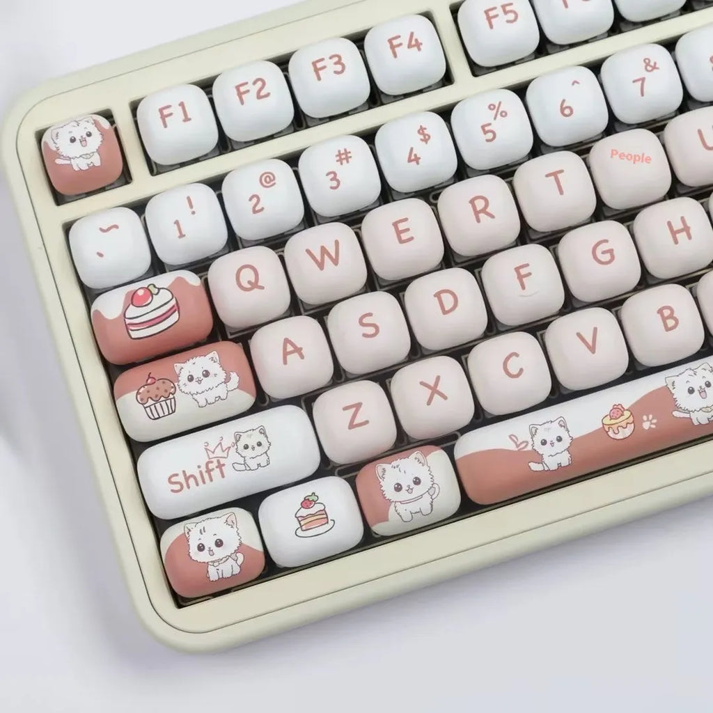Set of colourful cartoon dessert cat themed key caps for mechanical keyboards on a white background.