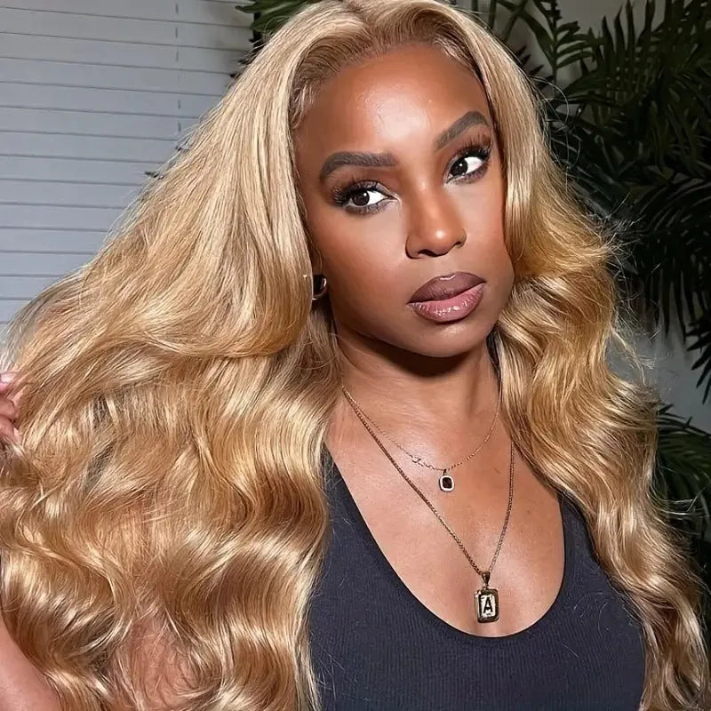 Light brown synthetic wig with golden waves and side bangs in exotic style