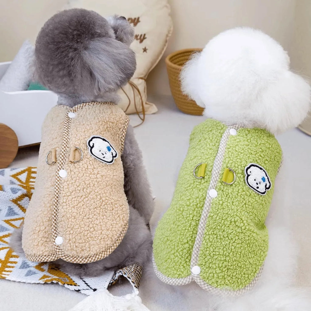 Green fleece dog vest with a metal leash ring on the back, for small pets.