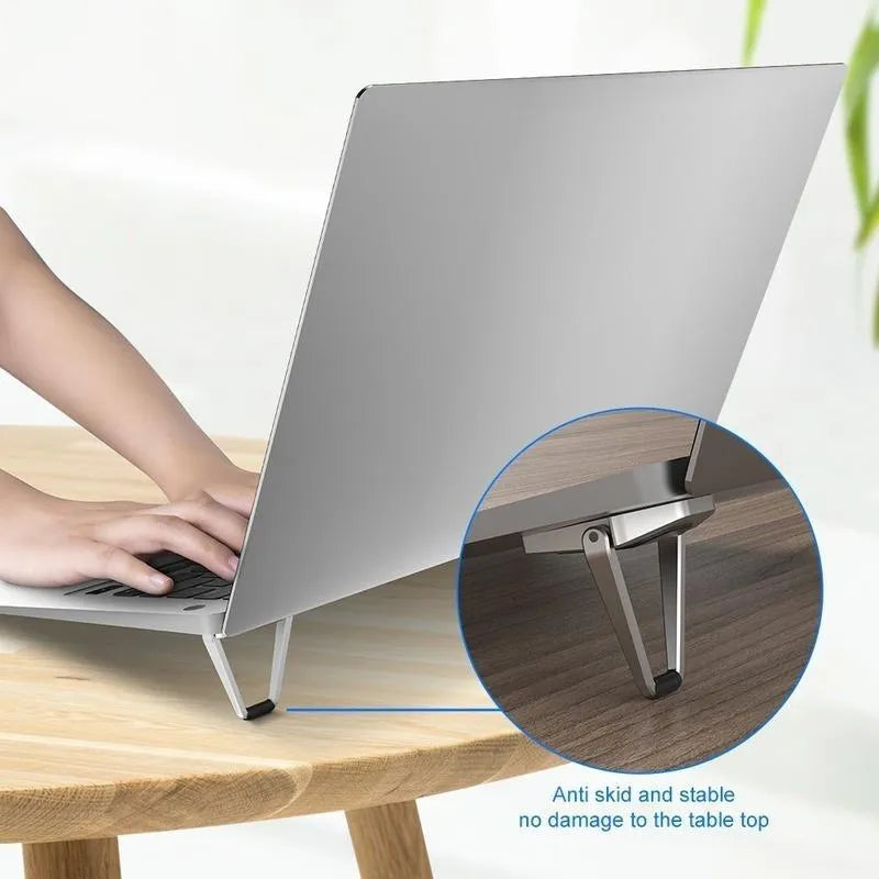 Invisible foldable aluminium alloy laptop bracket showing compact 4.8cm size and folding mechanism